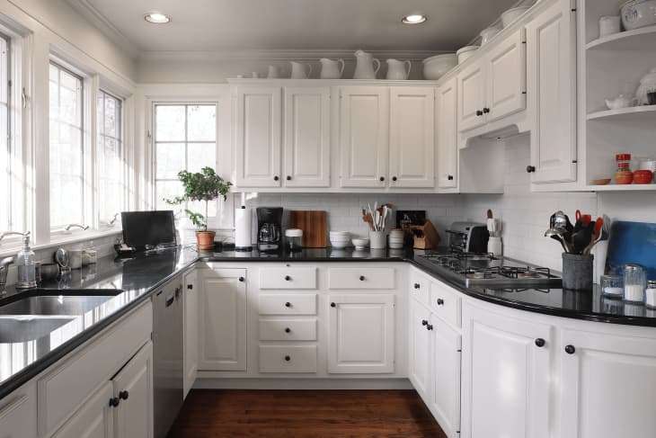Actually Attractive Ways to Style that Awkward Space Above Kitchen Cabinets